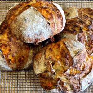 Cheddar sourdough made with an extra sharpe cheddar from Ashe county cheese (NC)